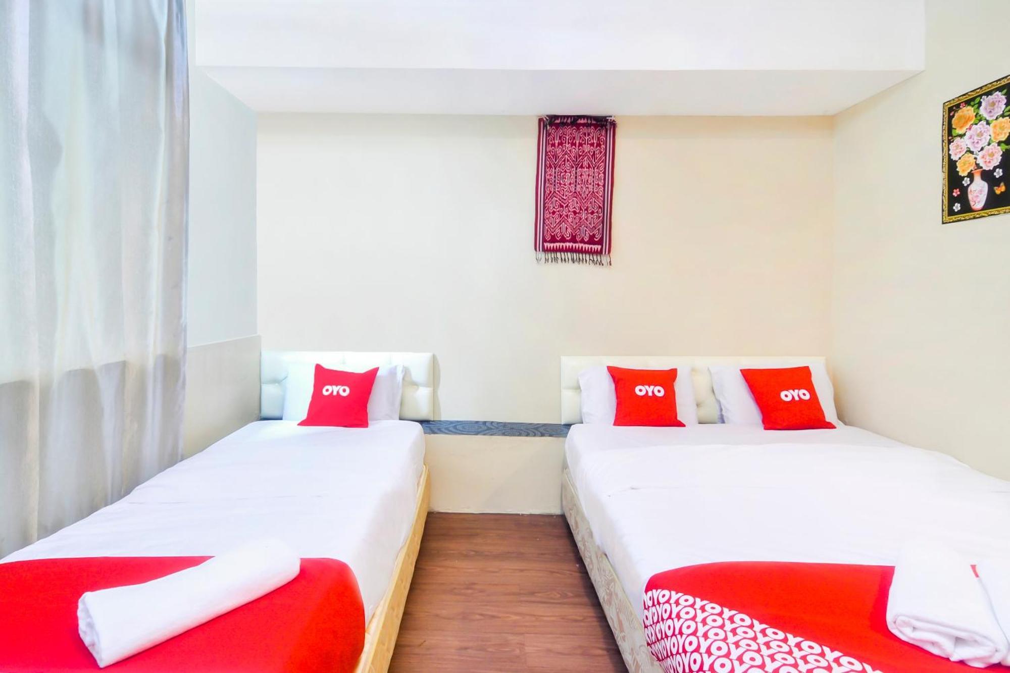 Oyo 44017 L & C Premium Stay Kuching Extérieur photo